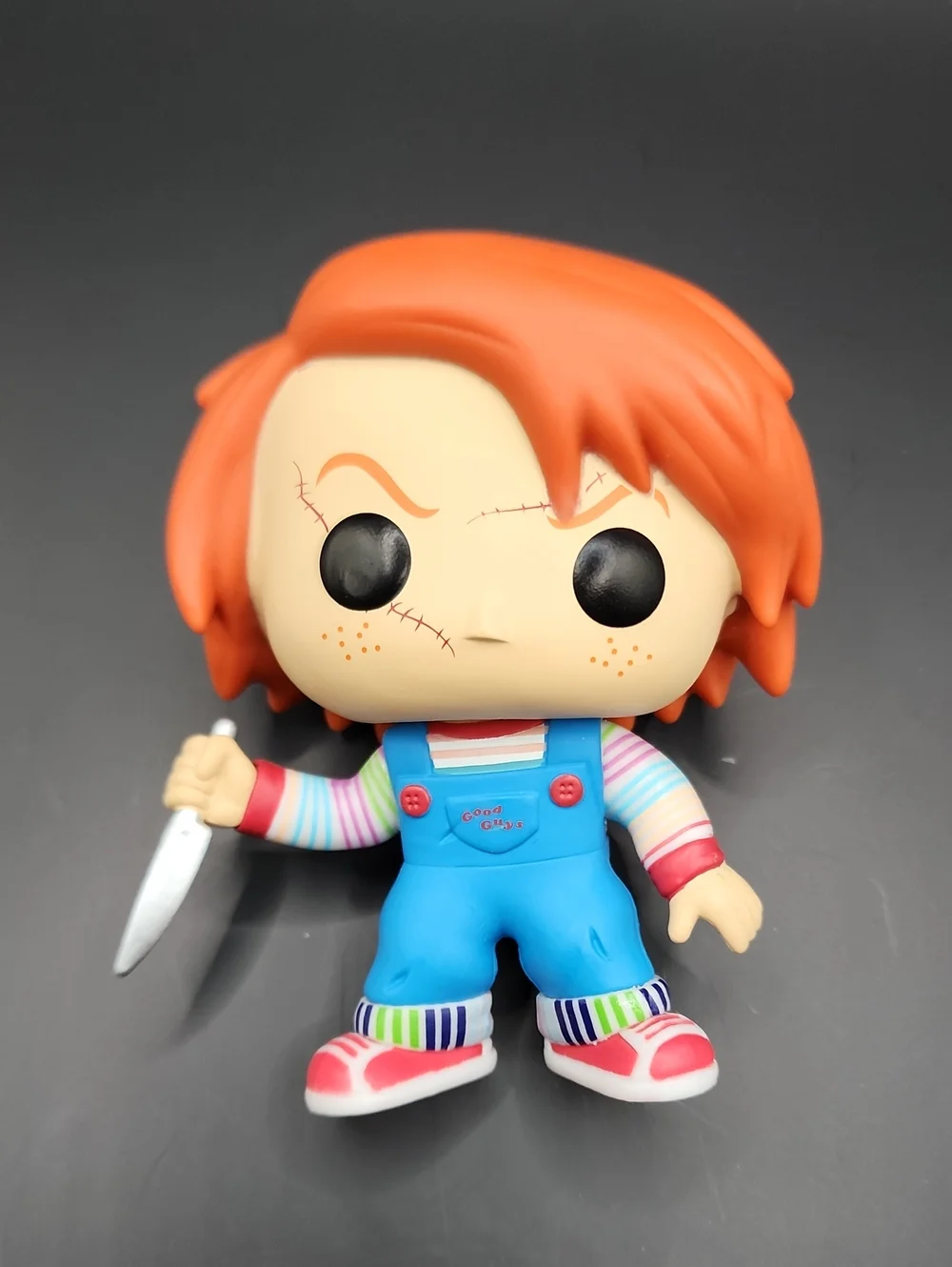 Funko Chucky Vinyl Figure with Orange Hair and Blue Overalls